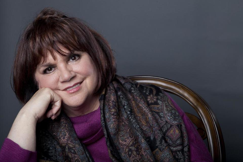 This Sept. 17, 2013 photo shows American musician Linda Ronstadt poses in New York to promote the release of her memoir "Simple Dreams." (Photo by Amy Sussman/Invision/AP)