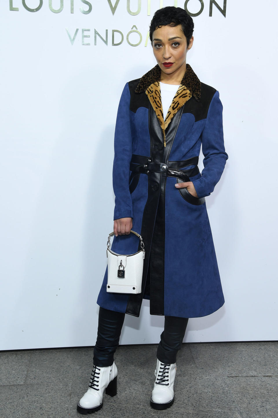<p><strong>2 October</strong> Ruth Negga paired a statement coat with black trousers and white Dr Marten boots. </p>