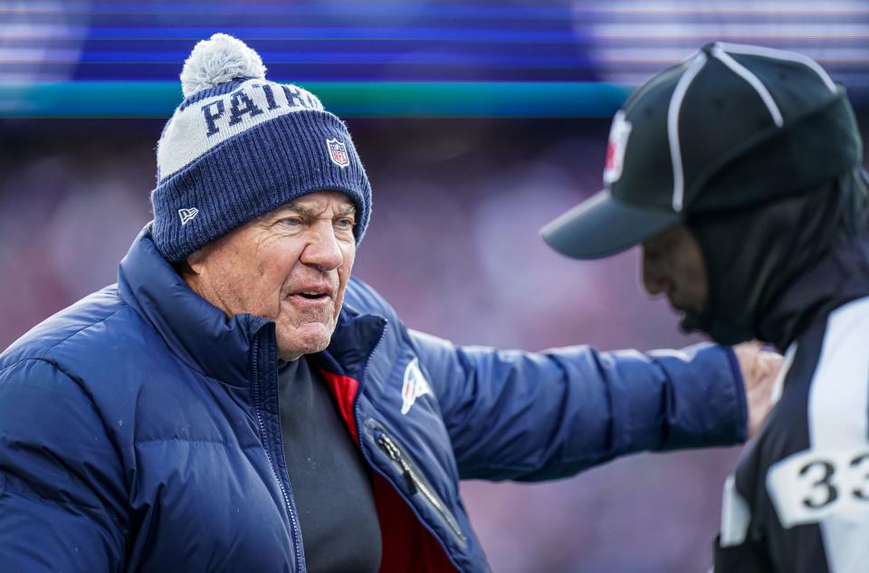 Nov 20, 2022; Foxborough, Massachusetts, USA; New England Patriots head coach Bill Belichick talk to an official  as the take on the New York Jets in the first half at Gillette Stadium. Mandatory Credit: David Butler II-USA TODAY Sports - 19473772