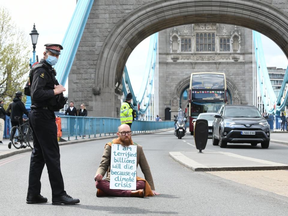 <p>Civil engineer Morgan Trowland, 38, halted traffic on Tower Bridge</p> (PA)