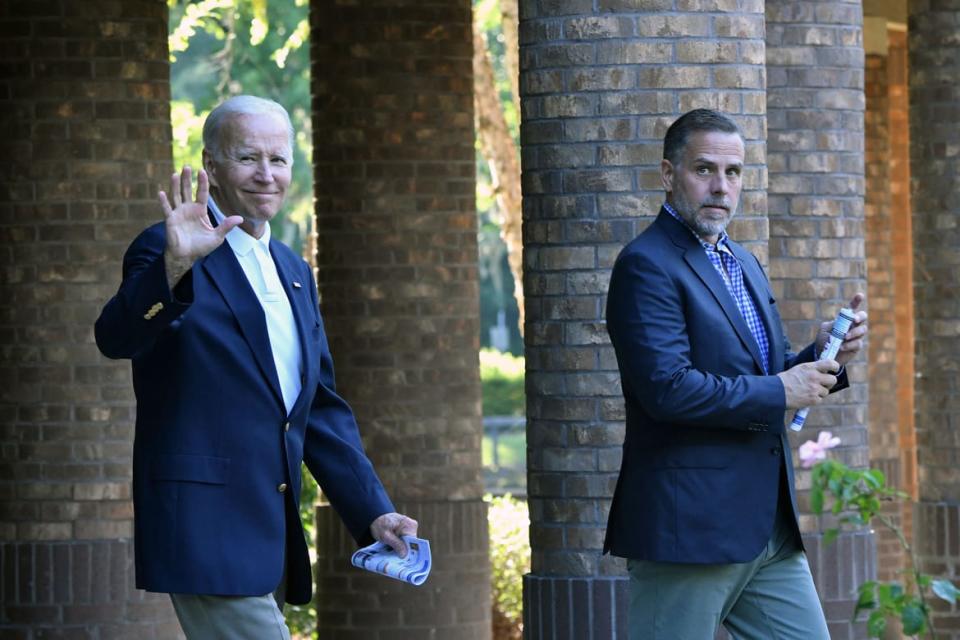 <div class="inline-image__caption"><p>President Joe Biden waves alongside his son Hunter Biden after attending mass at Holy Spirit Catholic Church in Johns Island, South Carolina on Aug. 13, 2022.</p></div> <div class="inline-image__credit">Nicholas Kamm/AFP via Getty Images</div>