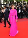 <p>Kristin Scott Thomas ose la robe rose flashy. (crédit AFP) </p>