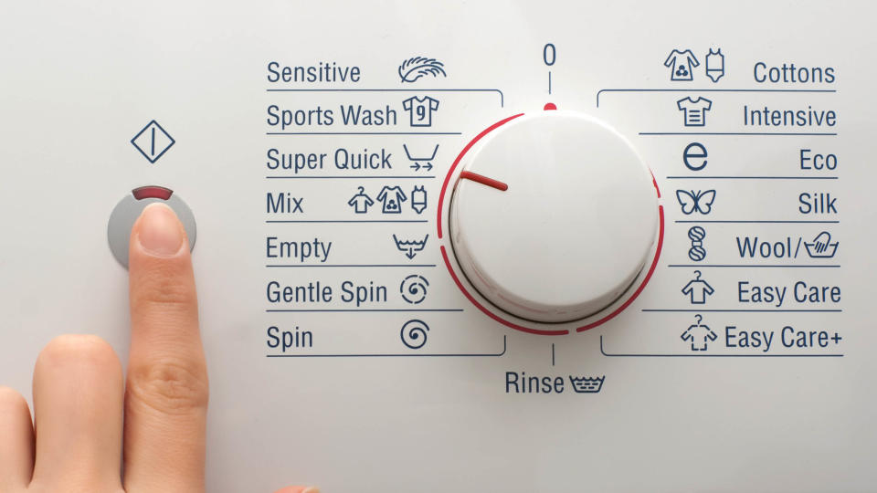 A washing machine's control panel set to the quick wash setting