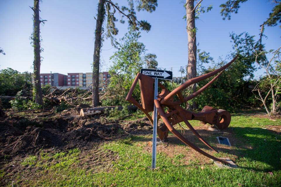 Piles of debris, missing roofs and walls are seen throughout Railroad square in the aftermath of the tornadoes that tore through Tallahassee a week prior.