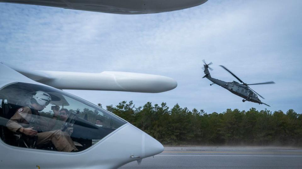 During January's casualty evacuation exercise, an HH-60W Jolly Green II helicopter transported a simulated patient from a forward-operating base to a location in friendly territory. Beta's Alia aircraft then transported the simulated patient to a medical facility in a mission that normally would have been done by a C-130. (Samuel King Jr./U.S. Air Force)