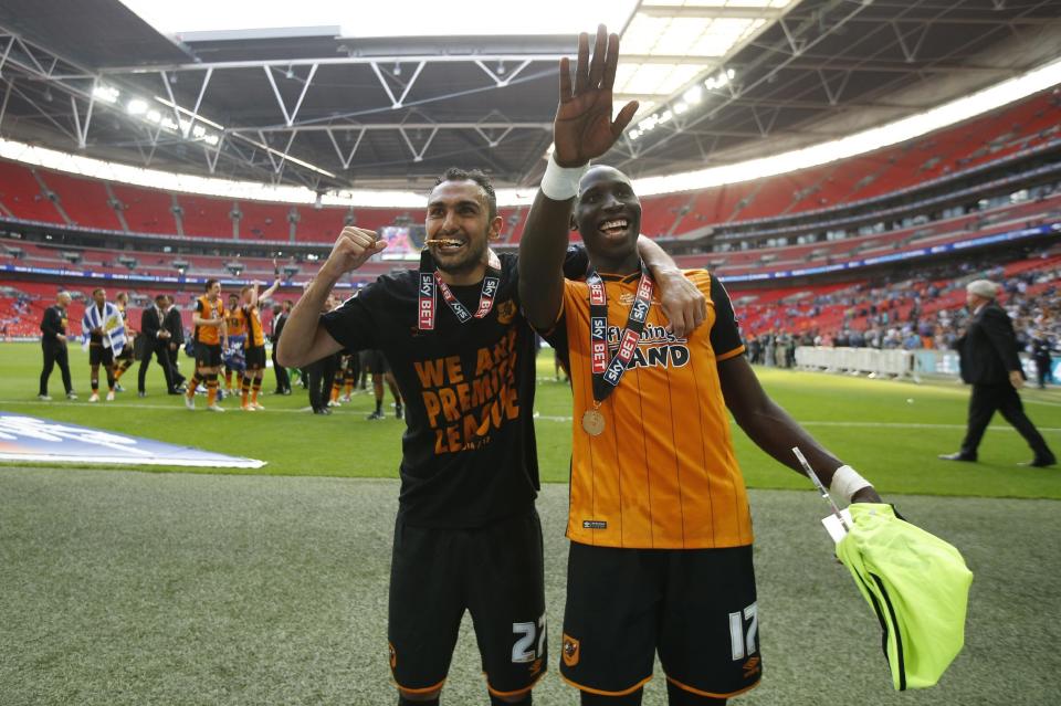 Britain Soccer Football - Hull City v Sheffield Wednesday - Sky Bet Football League Championship Play-Off Final - Wembley Stadium - 28/5/16 Hull City's Ahmed Elmohamady and Mohamed Diame celebrate winning promotion back to the Premier League Action Images via Reuters / Andrew Couldridge Livepic EDITORIAL USE ONLY. No use with unauthorized audio, video, data, fixture lists, club/league logos or "live" services. Online in-match use limited to 45 images, no video emulation. No use in betting, games or single club/league/player publications. Please contact your account representative for further details.