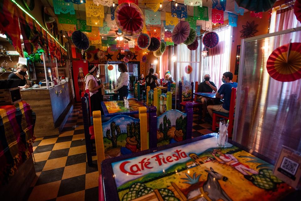 Customers dine at Cafe Fiesta in Woodbury.