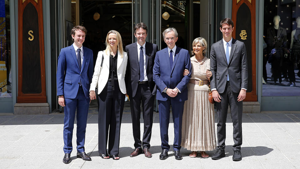 PARIS, FRANCE - JUNE 21: Head of French multinational corporation LVMH Bernard Arnault (C) and his wife Helene (2R), pose with their children (from L-R) Frederic Arnault, Delphine Arnault, Antoine Arnault and Alexandre Arnault after the ceremony marking Paris' Iconic department store 'La Samaritaine' reopening after 16 years of closure on June 21, 2021 in Paris, France. The department store was founded in 1870 by Ernest Cognacq and closed in 2005. The building, a Parisian masterpiece of Art Nouveau, is at the center of an ambitious renovation project. After 16 years of closure the building owned by LVMH, a luxury-goods maker, which was to reopen last April, is inaugurated June 21, 2021, due to the health crisis. On a surface of 20,000 m² it will combine a 5-star Cheval Blanc hotel designed by Peter Marino, ultra modern offices, housing units and shops. (Photo by Chesnot/Getty Images)