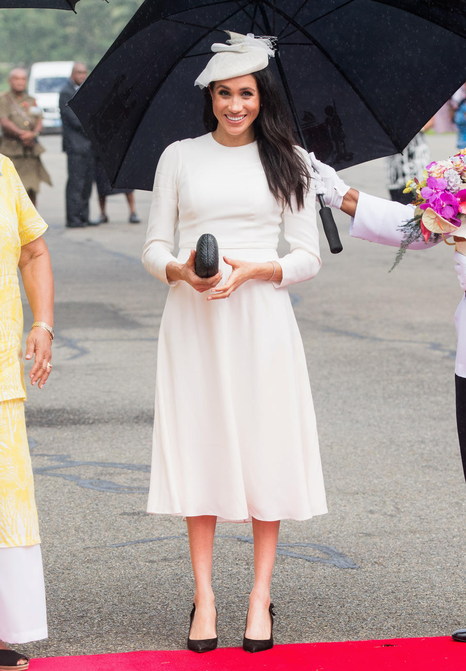 Meghan stuns in a Zimmerman dress and hat by Stephen Jones. Photo: Getty