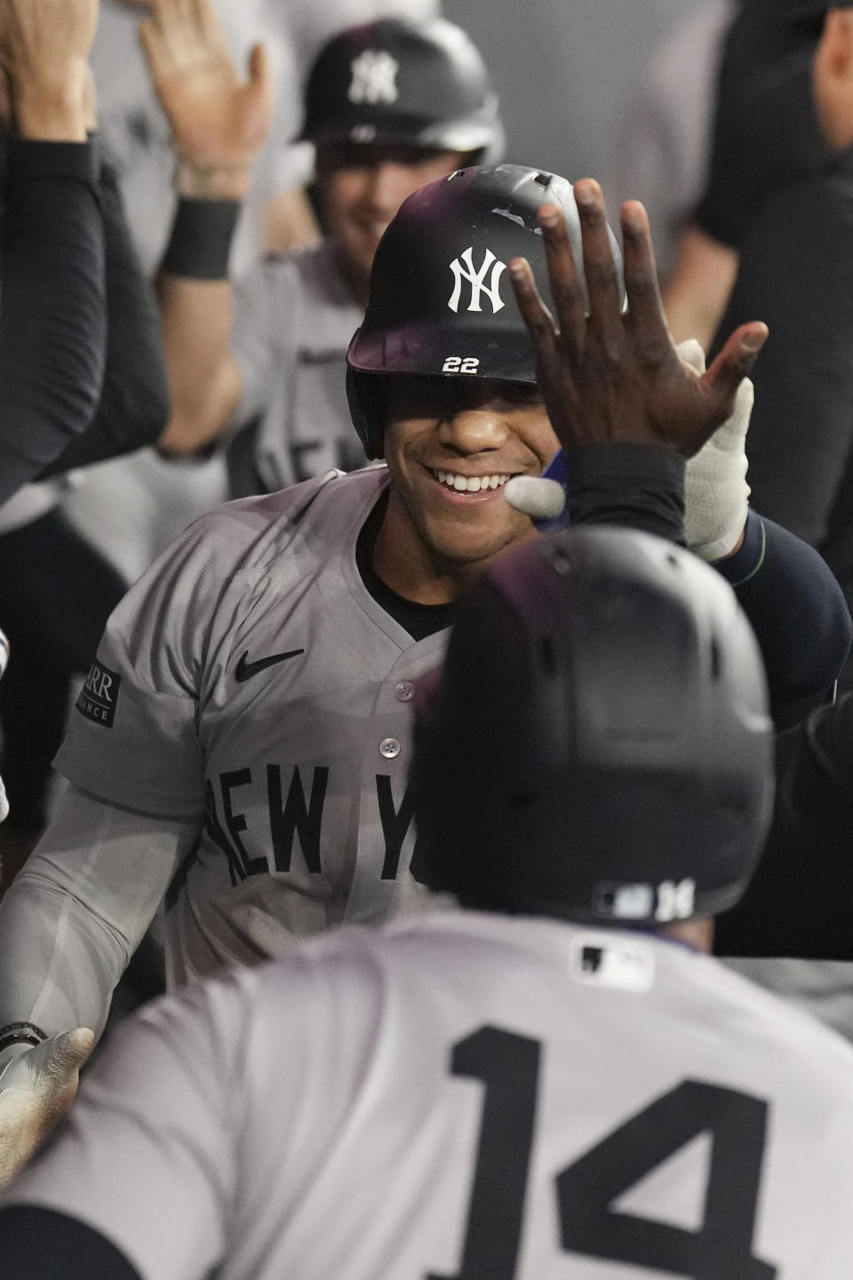 New York Yankees Juan Soto celebrates in the dugout after hitting a three-run home run off Toronto Blue Jays pitcher Yusei Kikuchi during the sixth inning of a baseball game Friday, June 28, 2024, in Toronto. (Chris Young/The Canadian Press via AP)