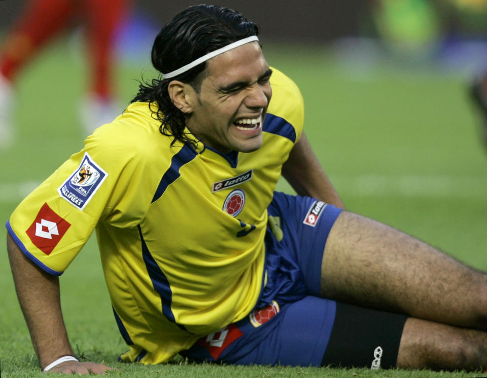 FILE - I this Nov. 17, 2007 file photo, Colombia's Radamel Falcao gestures on the ground after he was injured during a World Cup 2010 qualifying against Venezuela in Bogota, Saturday, Nov. 17, 2007. Falcao was injured this Wednesday, Jan. 22, 2014 during a French Cup game against Chasselay. (AP Photo/Ricardo Mazalan, File)