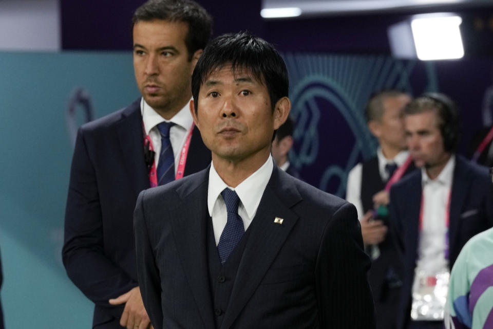Japan's head coach Hajime Moriyasu stands prior to a World Cup group E soccer match against Spain at the Khalifa International Stadium in Doha, Qatar, Thursday, Dec. 1, 2022. (AP Photo/Eugene Hoshiko)