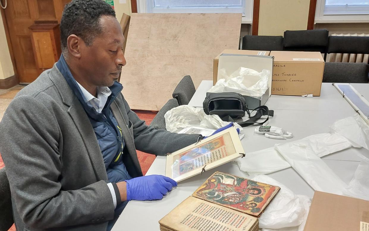 Eyob Derillo, an Ethiopian academic who advised on Harry Potter films, evaluates artefacts  in the King’s Own Royal Regiment Museum in Lancaster