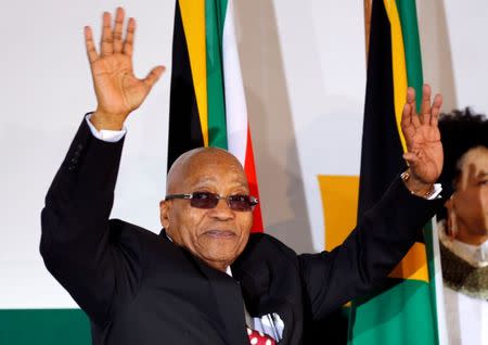 South Africa's President Jacob Zuma waves as he arrives to address the National Youth Day commemoration, under the theme "The Year of OR Tambo: Advancing Youth Economic Empowerment", in Ventersdorp, South Africa June 16, 2017. REUTERS/Siphiwe Sibeko