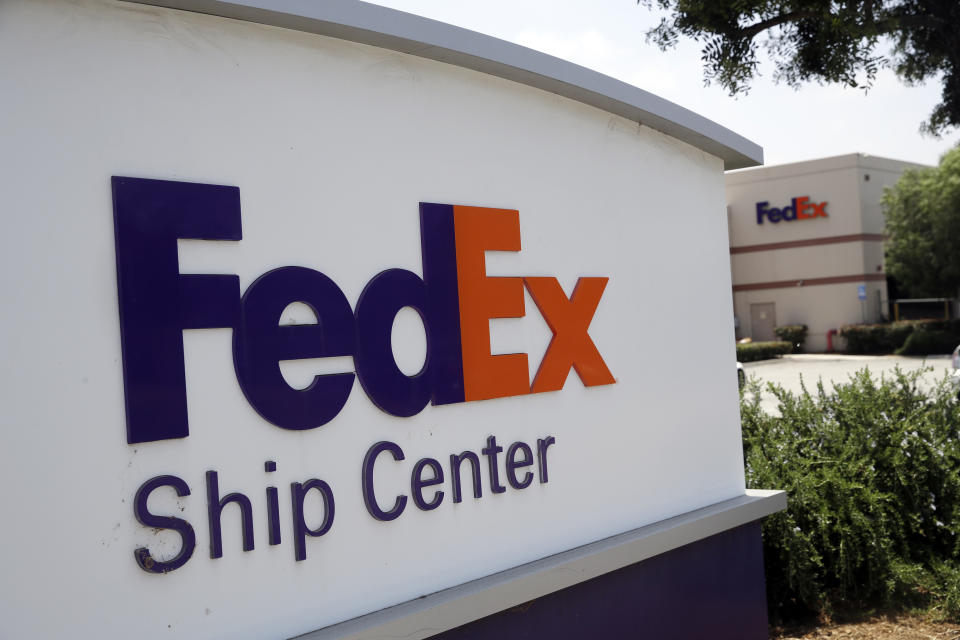 This Monday, June 24, 2019, photo shows an exterior view of a FedEx Ship Center in Los Angeles. FedEx is suing the United States government over export rules it says are virtually impossible to follow because it handles millions of packages a day. (AP Photo/Marcio Jose Sanchez)