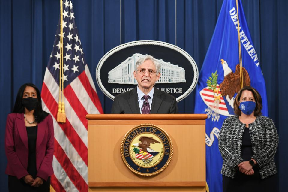 Attorney General Merrick Garland speaks at the Department of Justice alongside Associate Attorney General Vanita Gupta (L) and Deputy Attorney General Lisa Monaco on April 26, 2021, in Washington, D.C. Garland announced the Justice Department will begin an investigation into the policing practices of the Louisville Police Department in Kentucky.