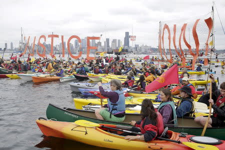 Activists protest at Terminal 5 at the Port of Seattle, Washington May 16, 2015. REUTERS/Jason Redmond