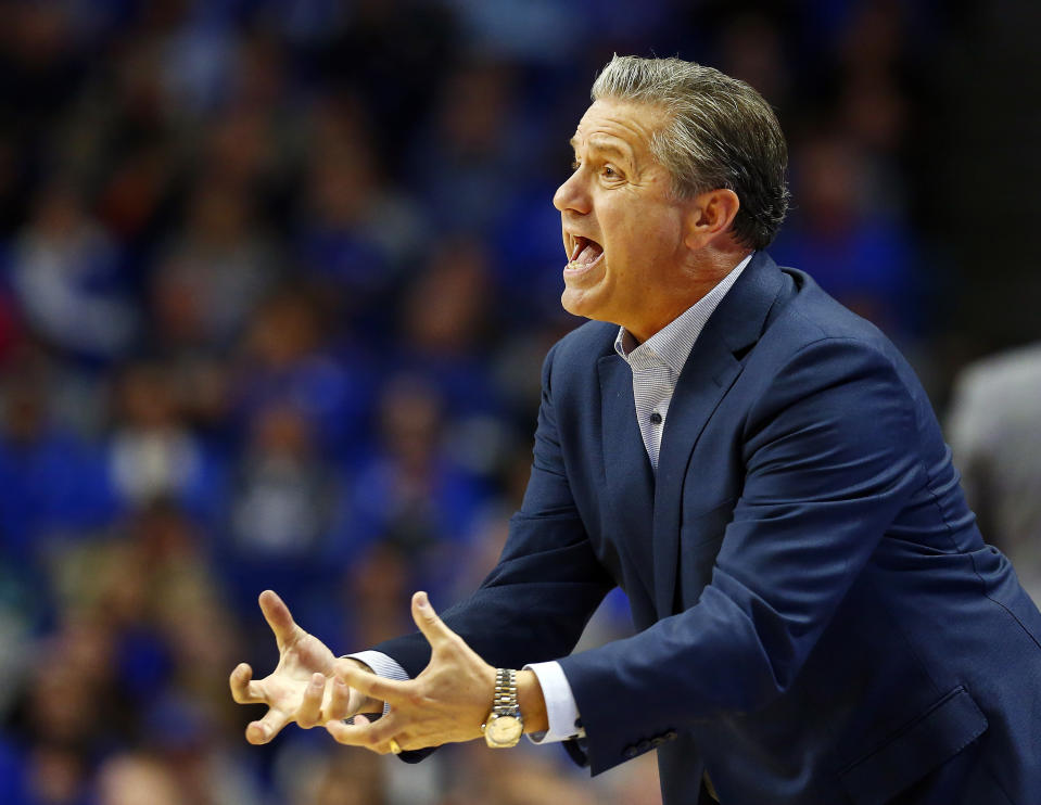 Kentucky coach John Calipari urges his team on during the second half of an NCAA college basketball game against Evansville in Lexington, Ky., Tuesday, Nov. 12, 2019. Evansville won 67-64. (AP Photo/James Crisp)
