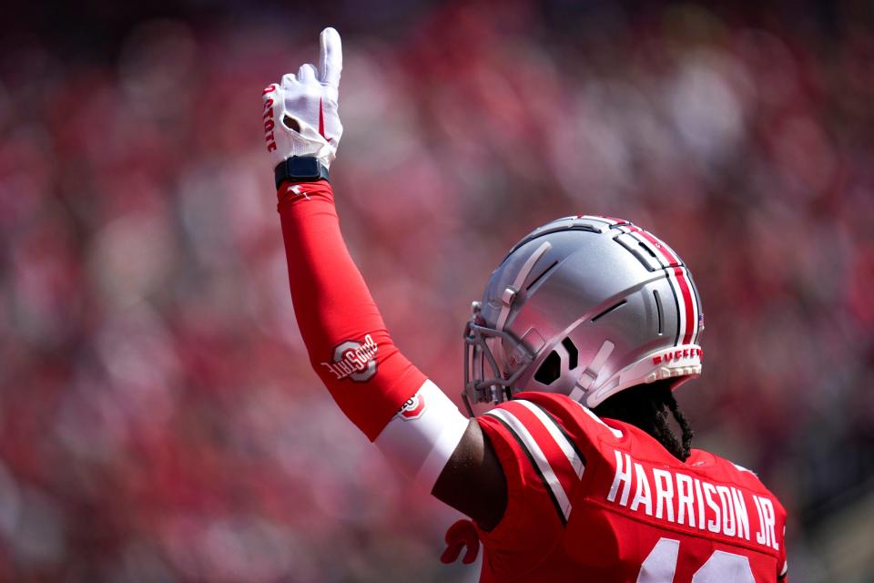 Apr 15, 2023; Columbus, Ohio, United States; Ohio State Buckeyes wide receiver Marvin Harrison Jr. (18) points a finger to the sky after a successful catch during the first quarter of the Ohio State Buckeyes spring game at Ohio Stadium on Saturday morning. Mandatory Credit: Joseph Scheller-The Columbus Dispatch<br>Football Ceb Osufb Spring Game Ohio State At Ohio State