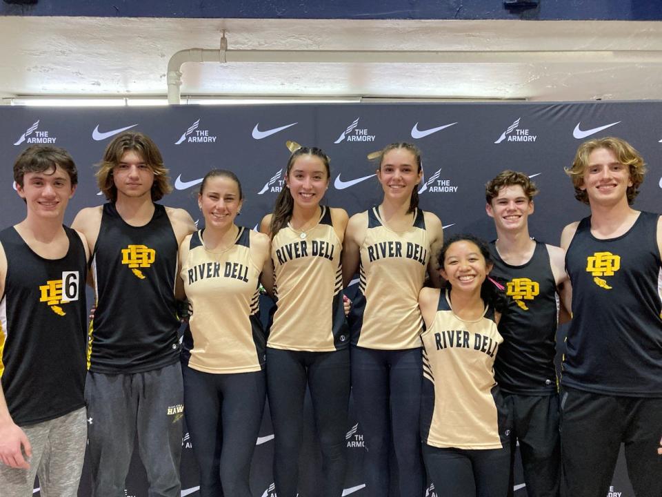 River Dell 4-x-800 teams L to R (Chris Baxter, Liam Schwabik, Christina Allen, Rachel Mills, Sarah Cookson, Izzy Gabay, Matt McGinniss, Aidan Grivas) after runnigng top North Jersey times at Varsity Classic