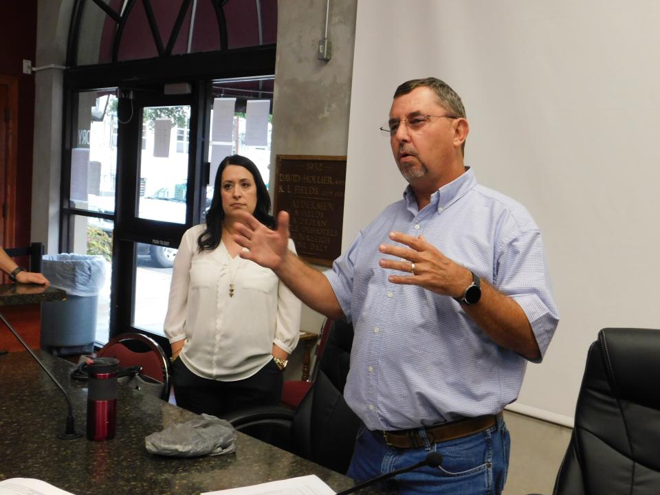 Parish president Jessie Bellard and Finance Director Amanda Cain speak at the St. Landry Parish Council meeting wherein Bellard revealed his proposed budget for the American Rescue Plan Act money the parish will receive.