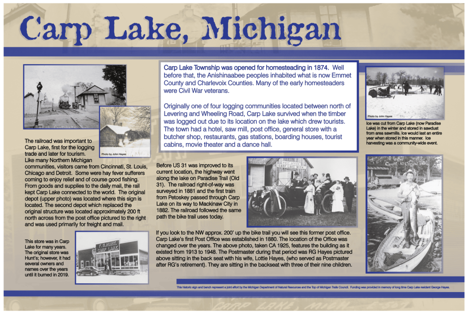 The historical sign contains interesting facts about the early days of the Carp Lake community.