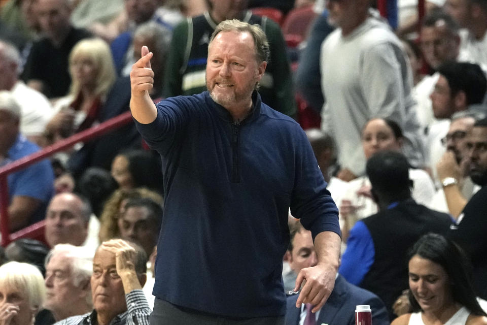 Milwaukee Bucks head coach Mike Budenholzer gestures during the second half of Game 3 in a first-round NBA basketball playoff series against the Miami Heat, Saturday, April 22, 2023, in Miami. (AP Photo/Lynne Sladky)