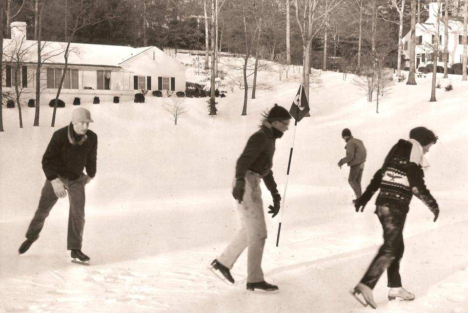 Ice skating on top of ice-coated snow during the big storm of March 1960 in Biltmore Forest.