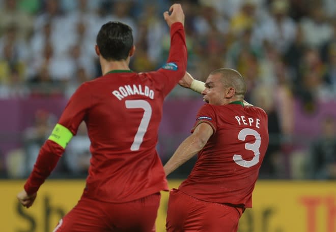 Portuguese defender Pepe (R) gestures during the Euro 2012 championships football match Germany vs Portugal on June 9, 2012 at the Arena Lviv. AFP PHOTO / PATRIK STOLLARZPATRIK STOLLARZ/AFP/GettyImages