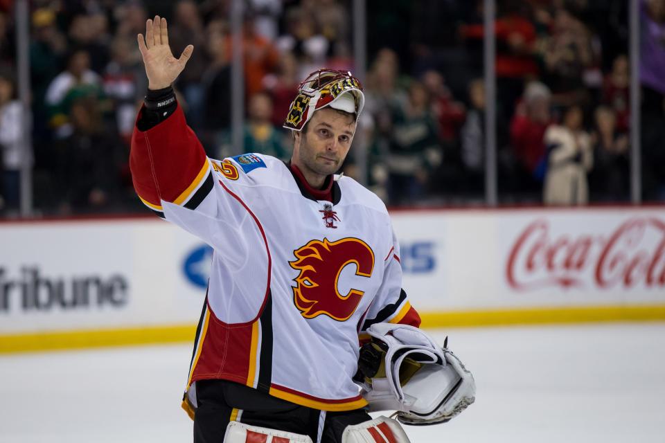 Apr 9, 2016; Saint Paul, MN, USA; Calgary Flames goalie Niklas Backstrom (32) salutes the fans after the game after being named first star after the game against the Minnesota Wild at Xcel Energy Center. Mandatory Credit: Brad Rempel-USA TODAY Sports