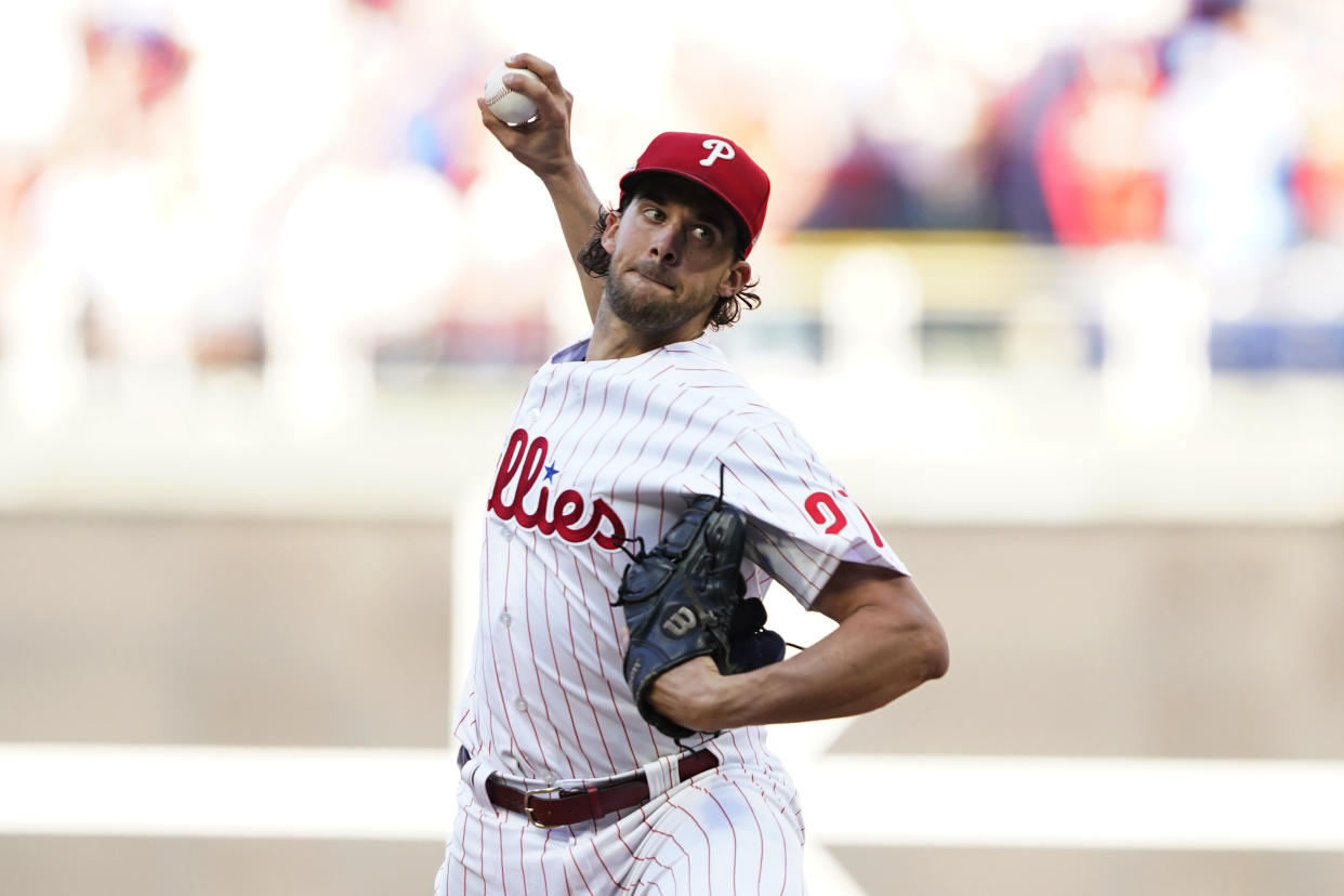 Philadelphia Phillies starting pitcher Aaron Nola (27) throws during the first inning in Game 3 of baseball's National League Division Series against the Atlanta Braves, Friday, Oct. 14, 2022, in Philadelphia. (AP Photo/Matt Slocum)