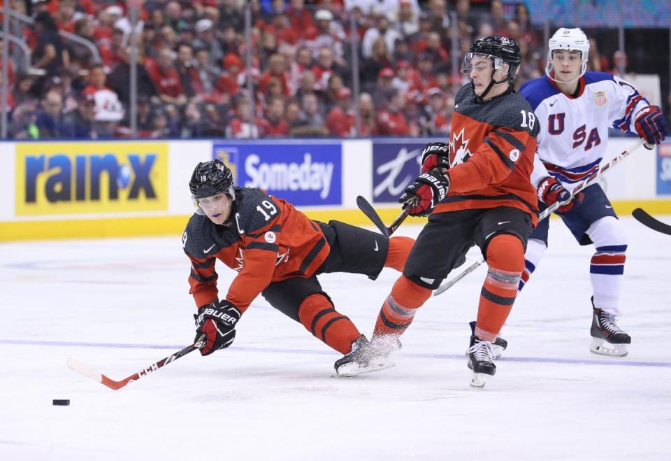 Dylan Stome #19 and Pierre-Luc Dubois #18 of Team Canada bump into each other during action against Team USA during a preliminary round game in the 2017 IIHF World Junior Hockey Championship at the Air Canada Centre on December 31, 2016 in Toronto, Ontario, Canada. The USA defeated Canada 3-1. (Photo by Claus Andersen/Getty Images)