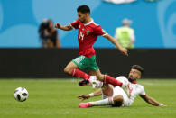 Soccer Football - World Cup - Group B - Morocco vs Iran - Saint Petersburg Stadium, Saint Petersburg, Russia - June 15, 2018 Morocco's Mbark Boussoufa in action with Iran's Ramin Rezaeian REUTERS/Henry Romero