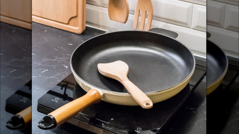 Skillet and wooden spatula