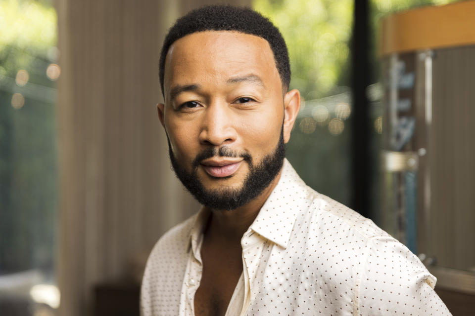 John Legend poses for a portrait on Monday, Aug. 15, 2022, in West Hollywood, Calif., to promote his latest double album "Legend." (Photo by Willy Sanjuan/Invision/AP)