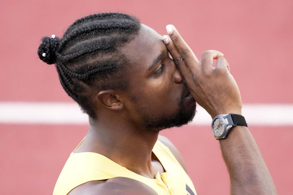 Noah Lyles celebrates after winning the men's 200-meter final during the U.S. Track and Field Olympic Team Trials Saturday, June 29, 2024, in Eugene, Ore. (AP Photo/Chris Carlson)