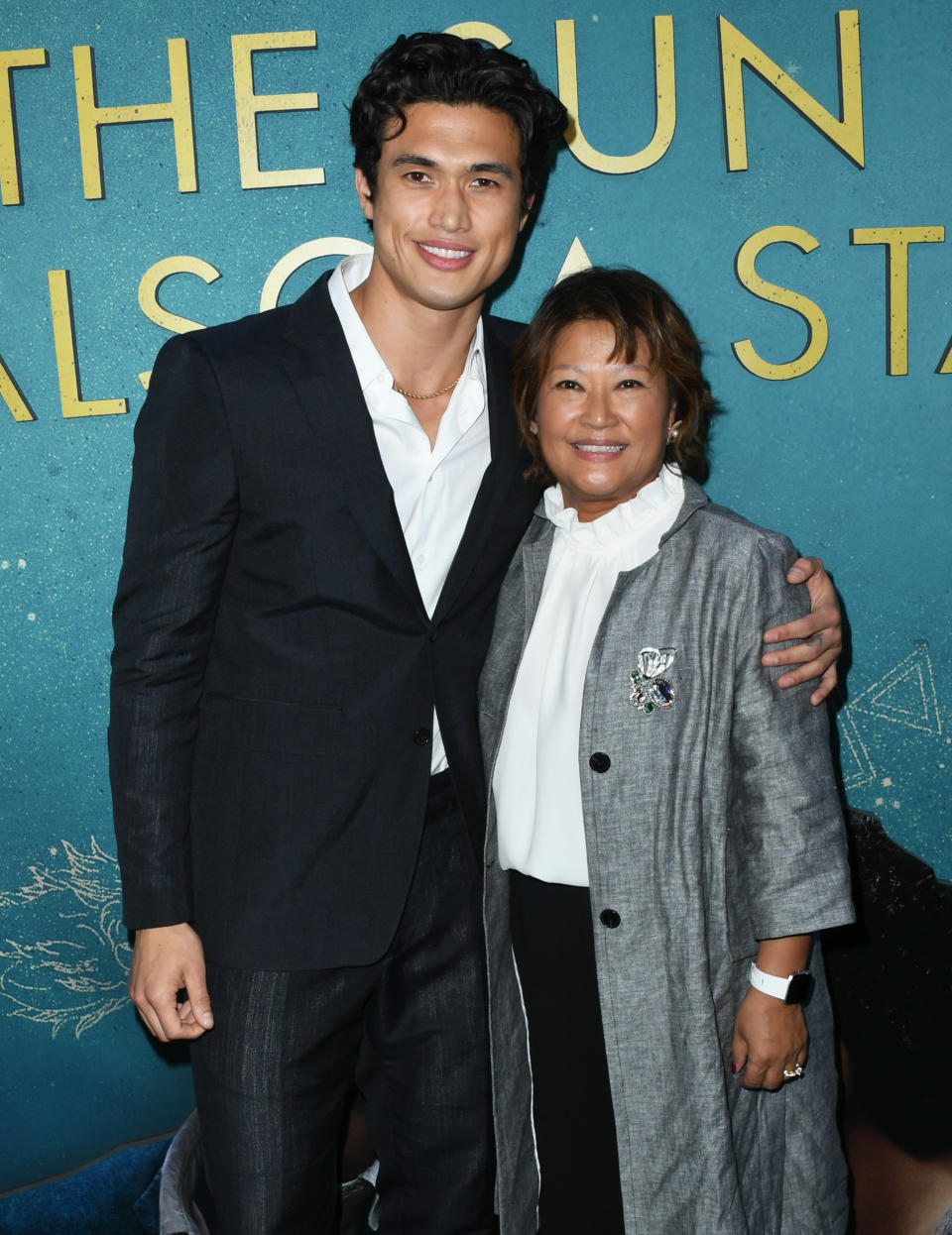 Charles Melton and his mom