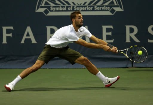 Benoit Paire of France hits a return to Michael Russell during day four of the Farmers Classic Presented By Mercedes-Benz at LA Tennis Center at the University of California, Los Angeles, on July 26. Russell won 7-5, 6-4