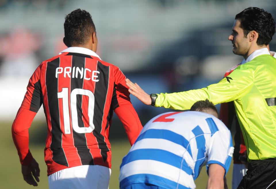 Ac Milan's Ghanaian defender Prince Kevin Boateng leaves the pitch during the friendly football match between Pro Patria and Ac Milan in Busto Arsizio on January 3, 2013. Boateng stormed off the pitch after racist chants from a group of fans on Thursday, forcing a friendly away game against fourth-tier club Pro Patria to be suspended. "Shame that these things still happen," the 25-year-old German-born Ghanaian player said on his Twitter account after the match was stopped in the 26th minute when he led his team off the pitch. Boateng picked up the ball, kicked it towards the stands and walked off the pitch in Pro Patria's home town of Busto Arsizio near Milan. AFP PHOTO / ALBERTO LINGRIA        (Photo credit should read ALBERTO LINGRIA/AFP via Getty Images)