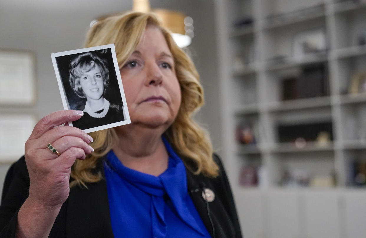 Nassau County District Attorney Anne Donnelly holds a photo of Diane Cusick on June 22, 2022, in Mineola, N.Y.  (Mary Altaffer / AP)