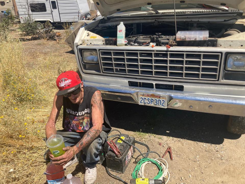 Josh Emerson, who lives on property at the corner of Iron Mountain Road and Market Street in Keswick, said his leukemia has slowed down his progress on loading up his vehicles so he can move away.