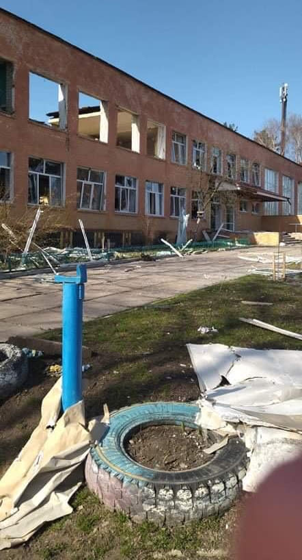 This April 24, 2022 photo provided by Inna Levchenko shows damage from Russian shelling to School No. 21, in Chernihiv, Ukraine. Levchenko opened the school as a shelter to hundreds of frightened families. Though she didn’t know it yet, 70 children she’d ordered to shelter in the basement would survive the blast. But at least nine people, including one of her students — a 13-year-old boy — would not. (Inna Levchenko via AP)