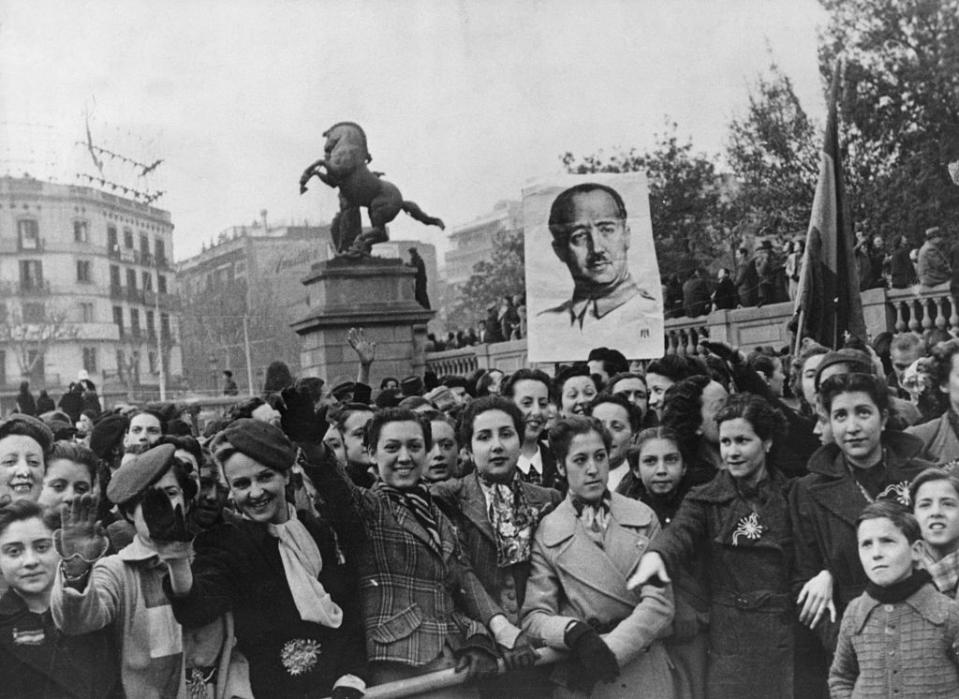 Barcelona populace greets Franco troops after city's successful seige by rebels. Undated photograph.<span class="copyright">Bettmann Archive</span>