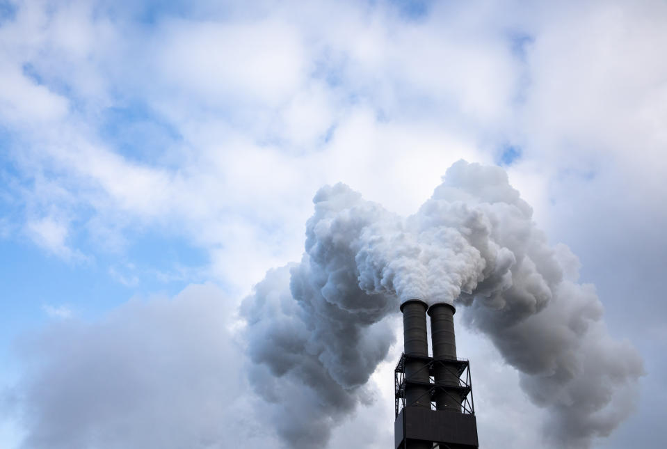 04 November 2019, Hamburg: Exhaust air rises from the chimneys of the Moorburg coal-fired power plant into the sky. The Vattenfall energy group operates one of the largest and most modern coal-fired power plants in Europe in Hamburg-Moorburg. Photo: Christian Charisius/dpa (Photo by Christian Charisius/picture alliance via Getty Images)