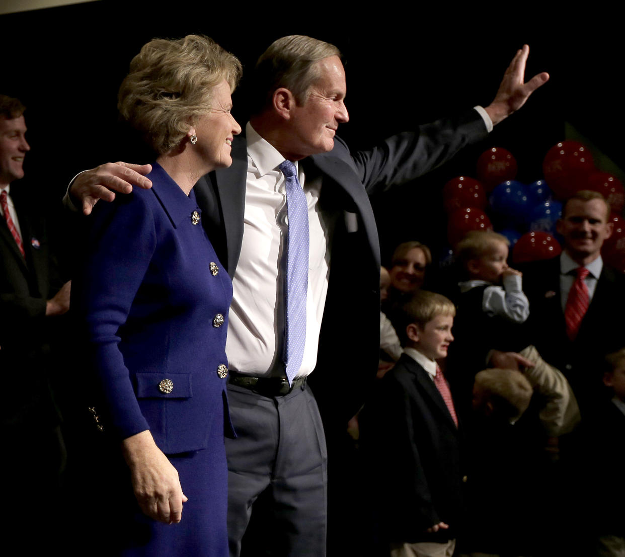 FILE - In this Nov. 6, 2012 file photo, U.S. Senate candidate, Rep. Todd Akin, R-Mo., and his wife Lulli wave to supporters after Akin gave his concession speech to U.S. Sen. Claire McCaskill, D-Mo. in Chesterfield, Mo. Akin, whose comment that women's bodies have a way of avoiding pregnancies in cases of "legitimate rape" sunk his bid for the U.S. Senate and became a cautionary tale for other GOP candidates, has died. He was 74. (AP Photo/Charlie Riedel, File)