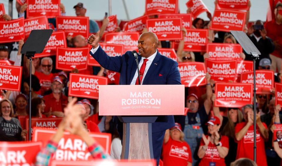 Lt. Gov. Mark Robinson acknowledges the crowd at a rally where Robinson formally launched his gubernatorial campaign Saturday, April 22, 2023, outside the Ace Speedway in Altamahaw, N.C.