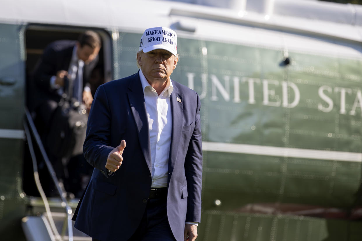 President Donald Trump hopes the NFL doesn't start its season if players choose to kneel during the national anthem. (Photo by Tasos Katopodis/Getty Images)