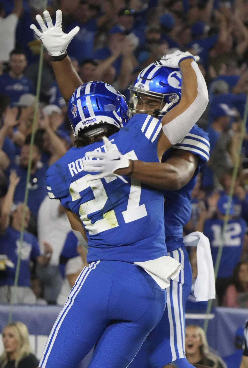 BYU wide receiver Chase Roberts (27) celebrates his touchdown with wide receiver Keanu Hill against Baylor on Saturday, Sept. 10, 2022, in Provo, Utah. (AP Photo/George Frey)