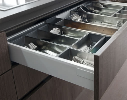 Plan for a run of long, slim drawers to accommodate cutlery, knife block and smaller utensils. With divisions in place, neatness can’t help but prevail.<br><br><a rel="nofollow" href="https://au.lifestyle.yahoo.com/better-homes-gardens/renovation/g/25097113/modern-classic-kitchen-renovation/" data-ylk="slk:READ MORE: Modern classic kitchen renovation;elm:context_link;itc:0;sec:content-canvas" class="link ">READ MORE: Modern classic kitchen renovation </a>