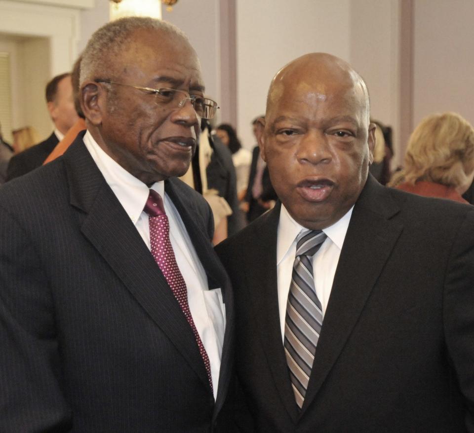Civil rights attorney Fred Gray, left, and Rep. John Lewis, D-Ga., in 2011. In 1961, Gray represented Lewis and others in a lawsuit that desegregated buses and facilities throughout the country. Four years later, Gray filed a lawsuit that protected Lewis and others in their march from Selma to Montgomery, Ala.